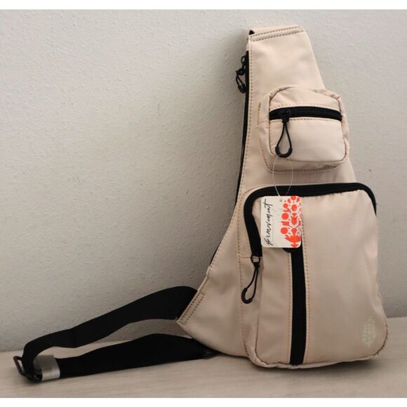 Free People Movement OB2110666 Unisex Home Plate/Taupe O/S Sprinter Sling Bag - Picture 1 of 14